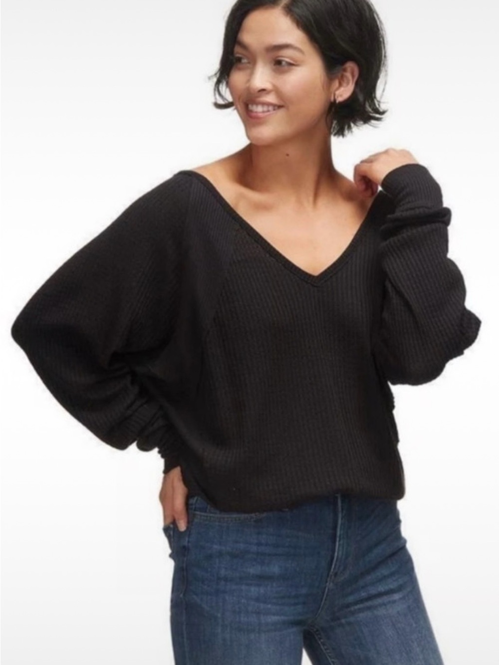 Free People size XS (can fit up to XL)  V-Neck Black Ribbed Women's Sweater